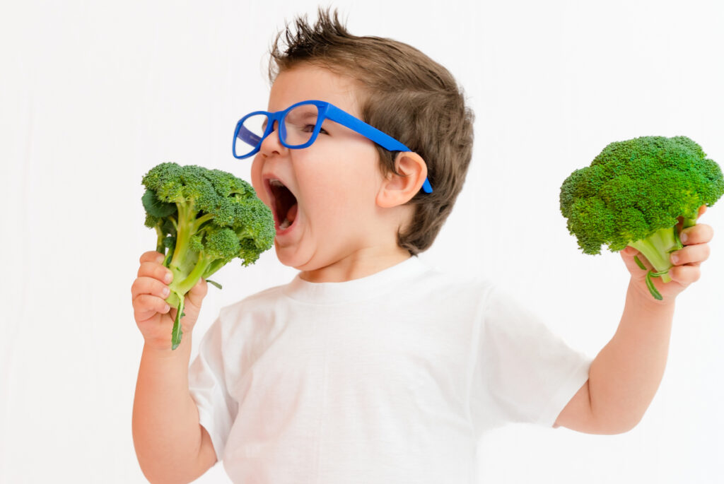 Autistic Child Eating Vegetables